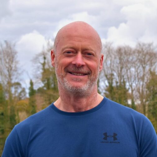 Profile photograph of M:power owner with trees in the background.